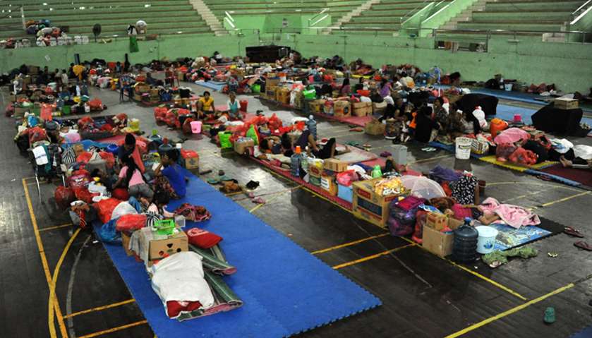 Balinese stay the night at an evacuation centre after Mt. Agung volcano erupts
