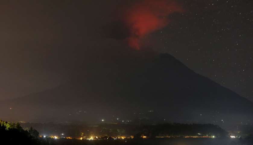 Mount Agung volcano erupts as seen from Glumpang village, Karangasem, Bali