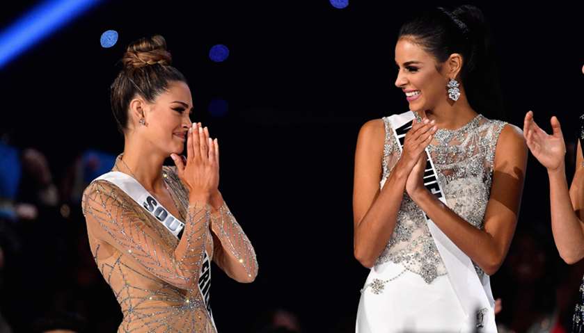 Miss South Africa 2017 Demi-Leigh Nel-Peters (L) reacts to being named a top 3 finalist