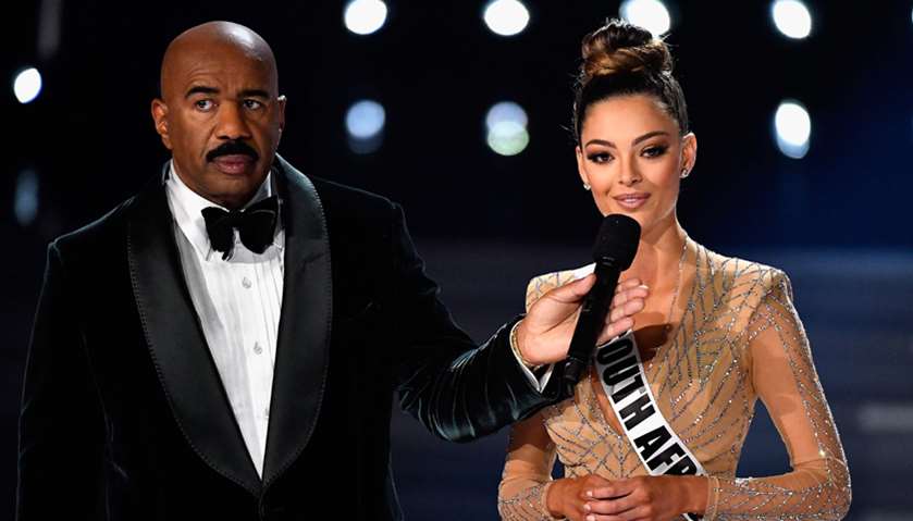 Television personality and host Steve Harvey (L) onstage with Miss South Africa 2017 Demi-Leigh Nel-