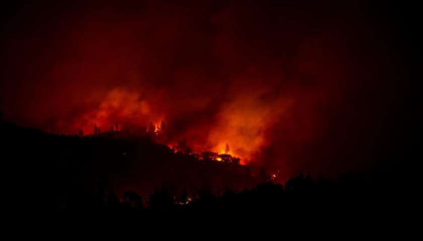 The Camp Fire burns along a ridge near Big Bend, California