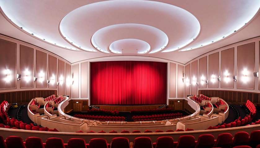 The closed red curtain at the Lichtburg cinema in Essen, western Germany