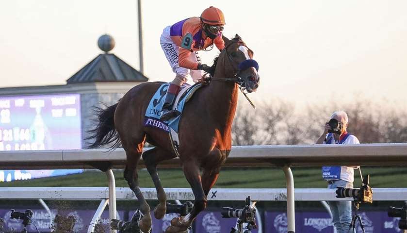 John Velazquez aboard Authentic (9) crosses the finish line after winning the Breeders\' Cup Classic