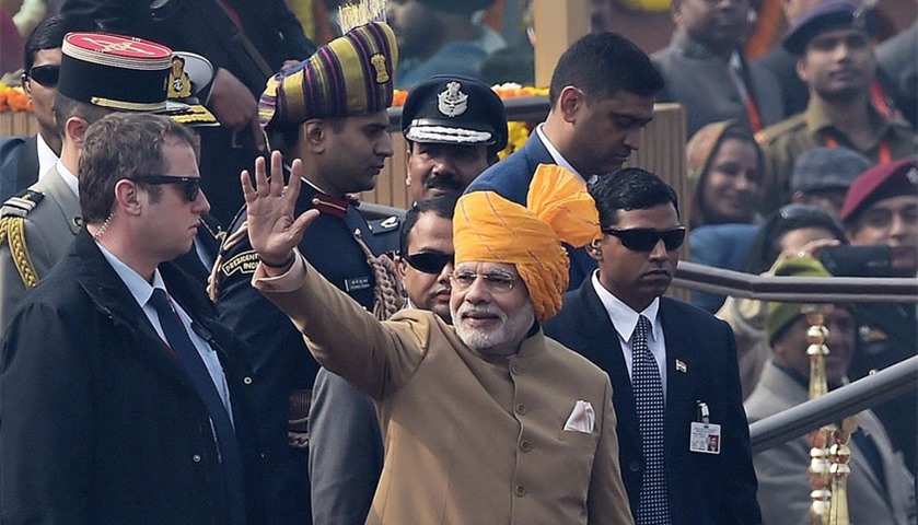 Indian Prime Minister Narendra Modi waves to spectators