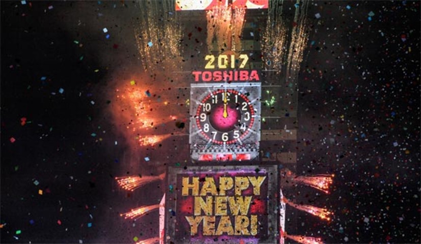 Fireworks and confetti mark the New Year in Times Square, New York