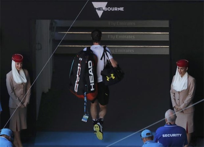Andy Murray leaves the court after losing to Mischa Zverev at the Melbourne Park on Sunday