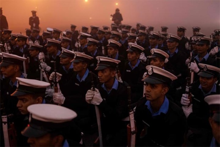 Indian military personnel take position as they rehearse for the Republic Day parade