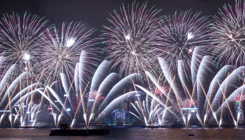 Fireworks explode over Victoria harbour during New Year celebrations in Hong Kong
