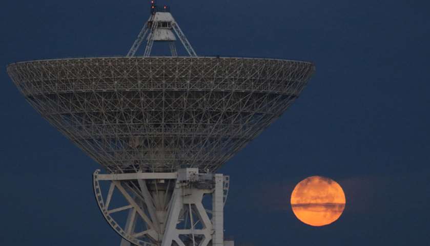 A \"supermoon\" full moon over the RT-70 radio telescope in the village of Molochnoye, Crime