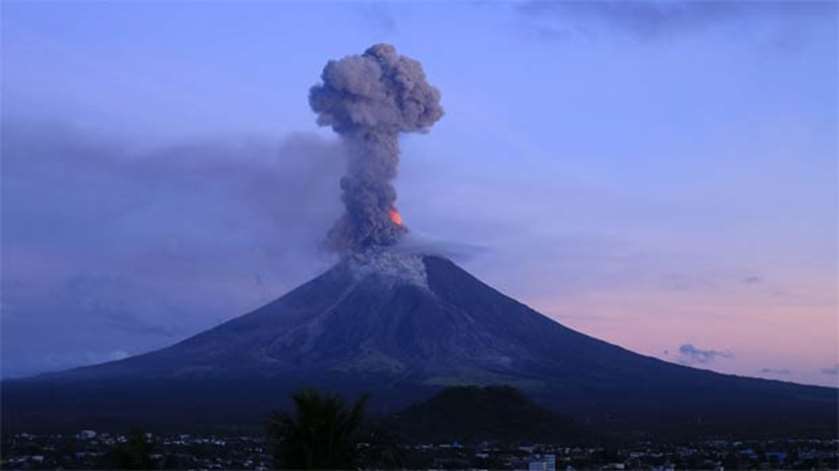 The volcano eruption is seen from the city of Legazpi in Albay province, south of Manila