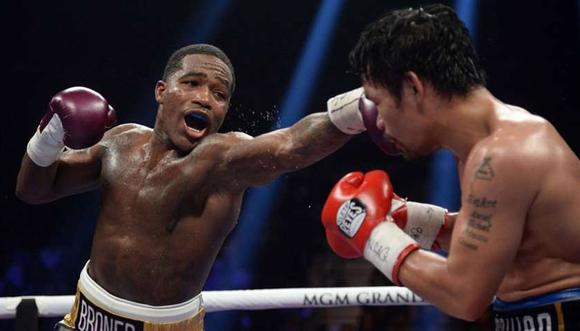 Manny Pacquiao (black trunks) and Adrien Broner box during a WBA welterweight world title boxing mat