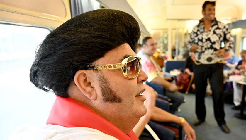 Elvis fans leaving from Central Station in Sydney as they head to the Parkes Elvis Festival