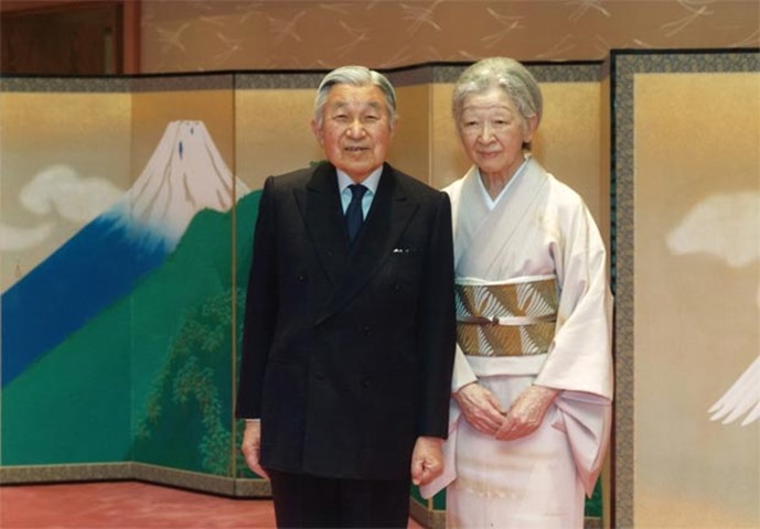 Emperor Akihito poses for a photo with Empress Michiko at the Imperial Palace earlier this month
