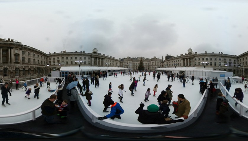 People skate on an ice rink at the Somerset House in London, England