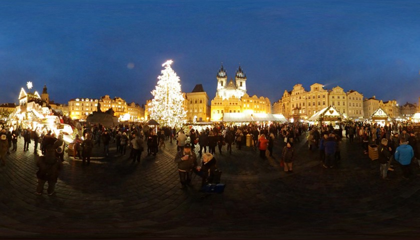 A Christmas tree illuminates the Old Town Square in Prague, Czech Republic