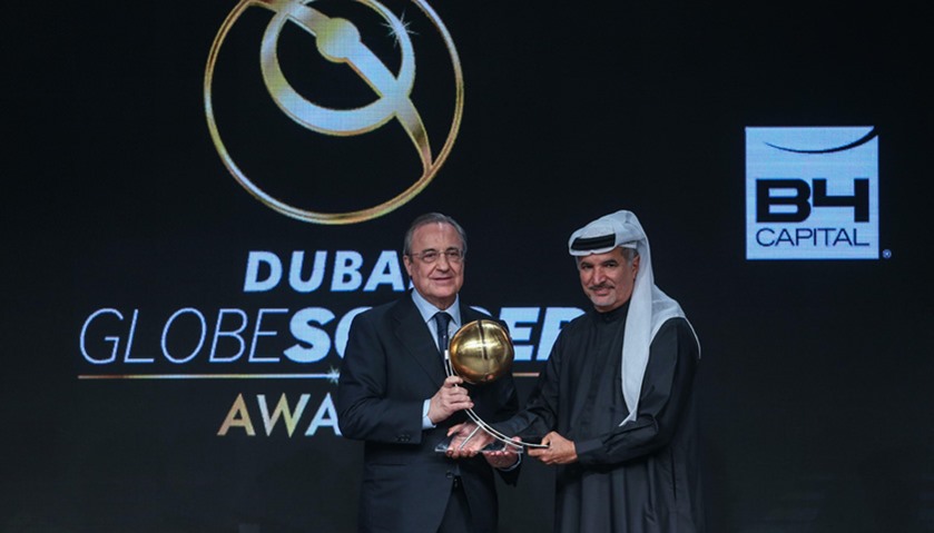 Florentino Perez (L), President of Real Madrid,  receives the award for Best Club of the Year