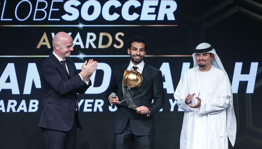 Mohamed Salah (C) receives the best Arab player of the year award