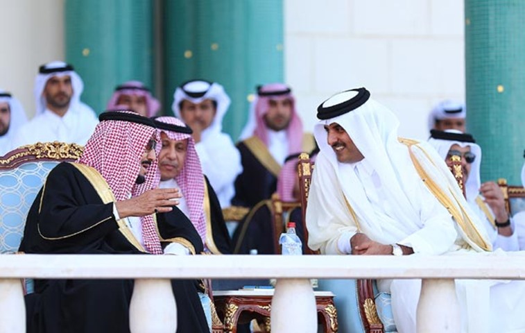 HH the Emir with King Salman at the welcoming ceremony in Doha on Monday