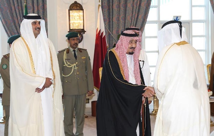 King Salman greets dignitaries as HH the Emir looks on