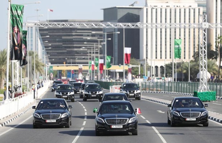 The motorcade passes through Doha Corniche on Monday