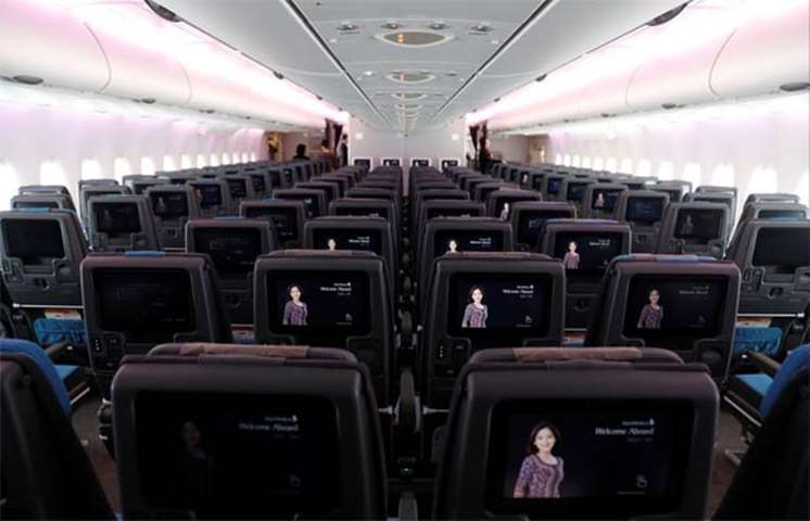 The economy class cabin in a new Singapore Airlines\' A380 is seen at Changi Airport on Thursday