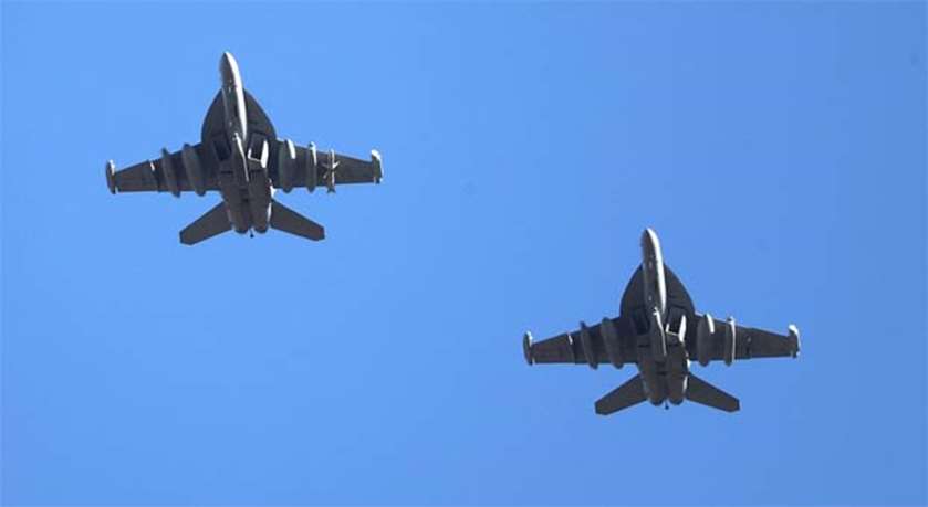 US Air Force EA-18G Growler fighter jets fly over the Osan Air Base in Pyeongtaek on Monday