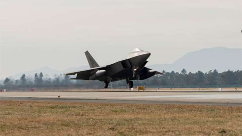 A US Air Force F-22 Raptor fighter jet touches down at Gwangju Air Base in Gwangju