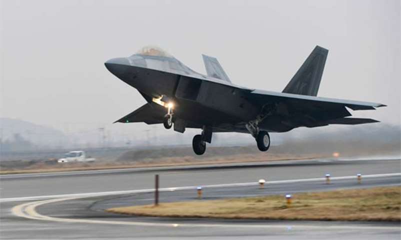 A US Air Force F-22 Raptor stealth jet takes off at an air base in Gwangju