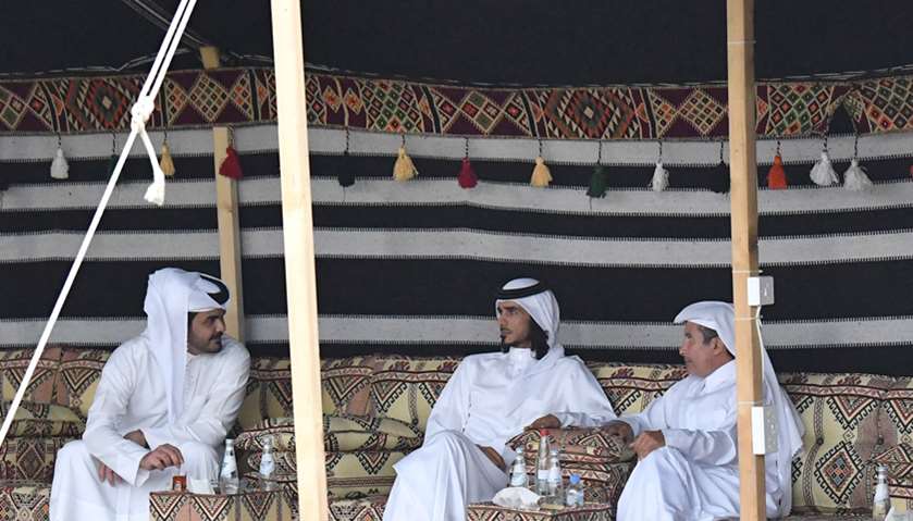Amir participates in Arda (Qatar’s traditional sword dance) held in Amiri Diwan Yard