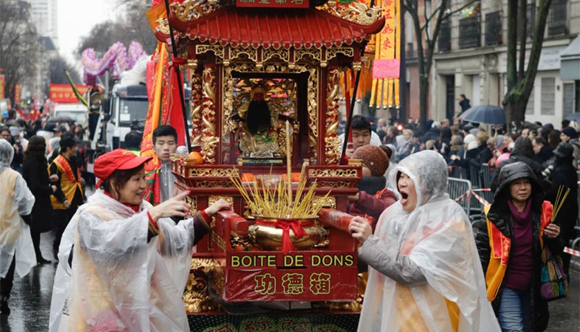 Members of the Chinese community celebrate  in Paris