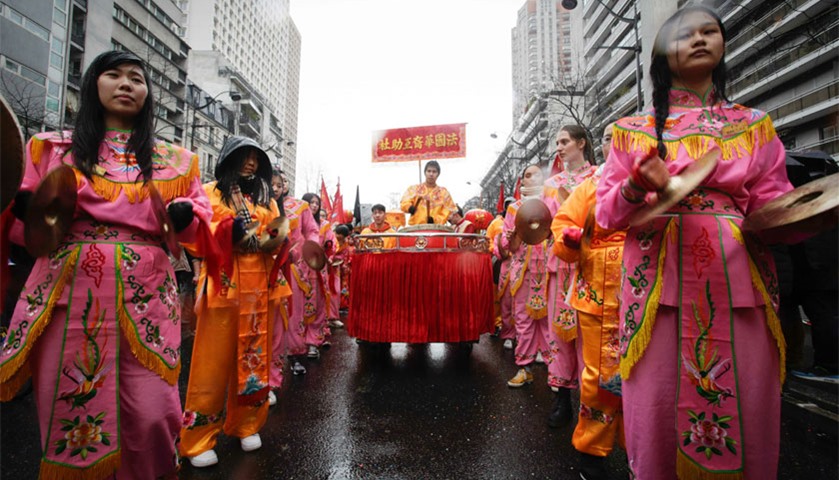 Members of the Chinese community celebrate in Paris