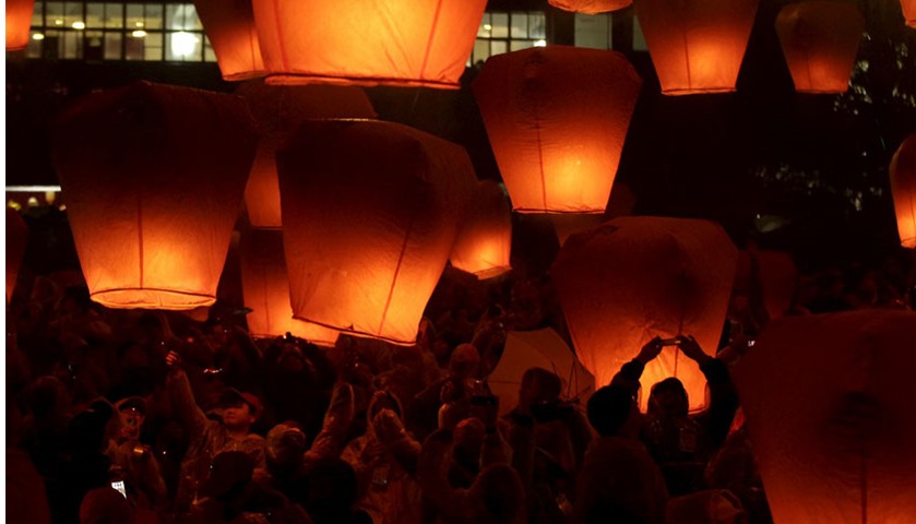 People release sky lanterns ahead of the traditional Chinese Lantern Festival in Pingxi, New Taipei 