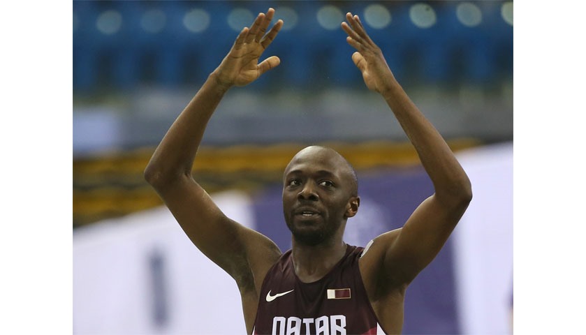 Qatar\'s Rashid al-Mannai gestures as he competes in the Men Triple Jump