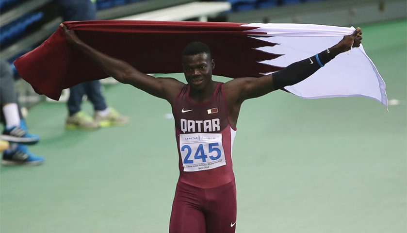 Qatar\'s Abdalelah Hassan celebrates winning the 400m men\'s event