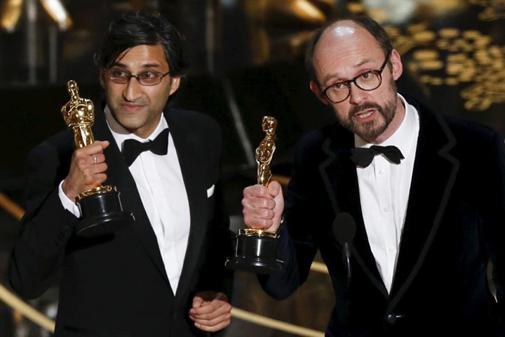 Asif Kapadia (L) and James Gay-Rees accept the Oscar for the Best Documentary Feature for \"Amy\"