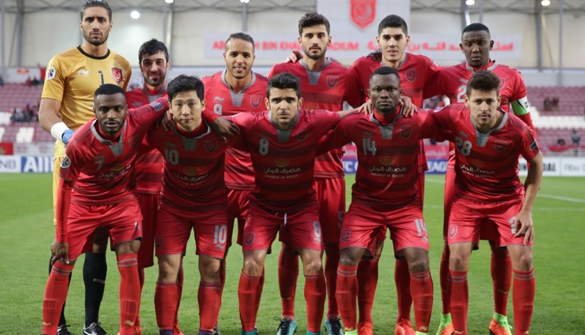 Qatar\'s Lekhwiya SC players pose for a picture ahead of match