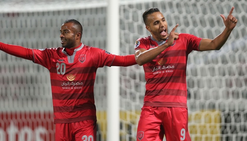 Qatar\'s Lekhwiya players Ali Hassan Afif (L) and Youssef El-Arabi celebrate after scoring