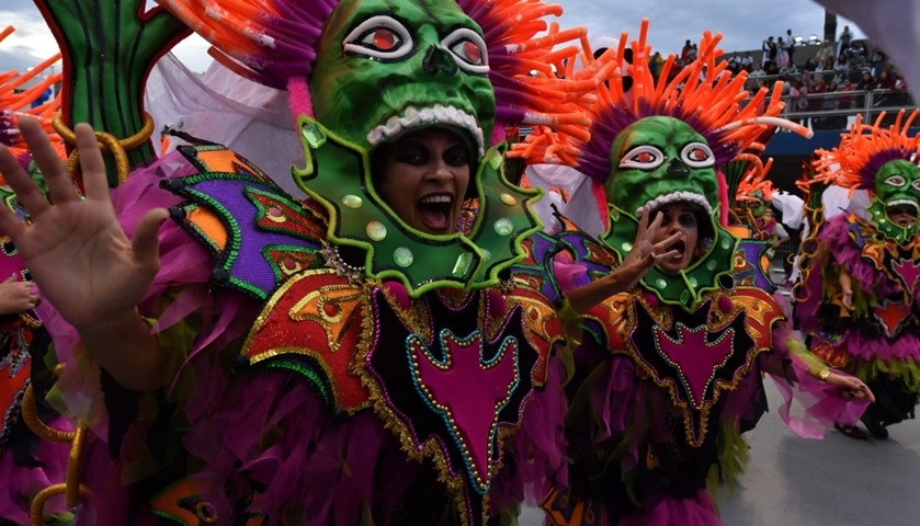 Revelers of the Aguia de Ouro samba school perform