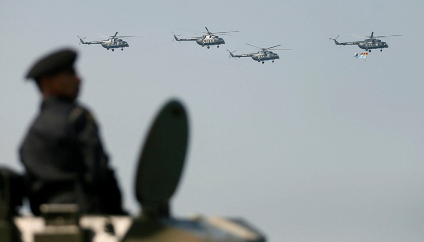 An army officer looks at the military helicopters during Sri Lanka\'s 69th Independence day celebrati
