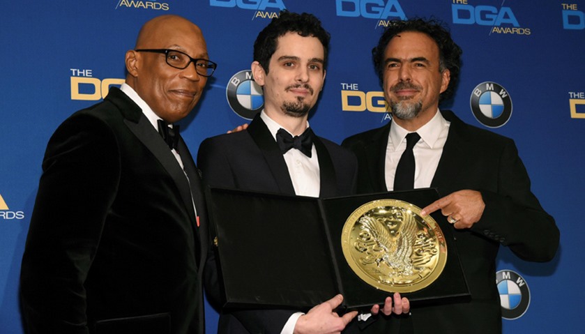 Damien Chazelle (C), winner of the Feature Film Award for his work on \"La La Land\"
