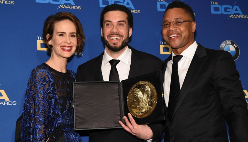 Ezra Edelman (C), winner of the Documentary award with presenters Sarah Paulson (L) and Cuba Gooding