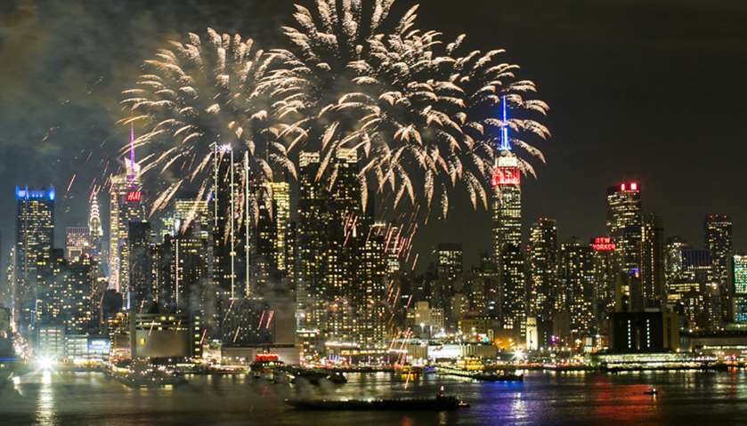 Fireworks explode against the backdrop of midtown Manhattan marking Chinese New Year celebrations