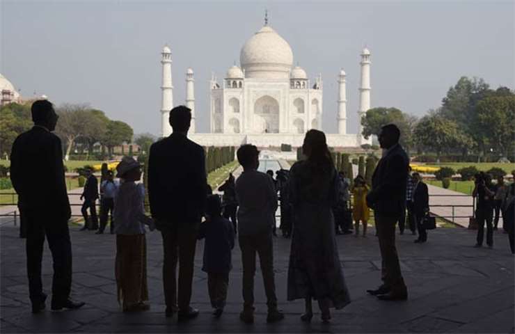 Justin Trudeau and his family are silhouetted as they visit the Taj Mahal in Agra