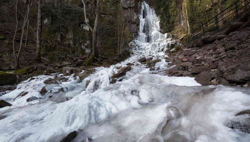 The frozen Nideck waterfall in Oberhaslach, eastern France.