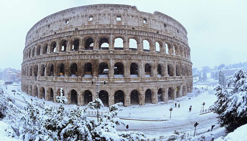 The Colosseum is seen during a heavy snowfall in Rome, Italy