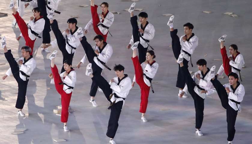 Performers take part in the opening ceremony