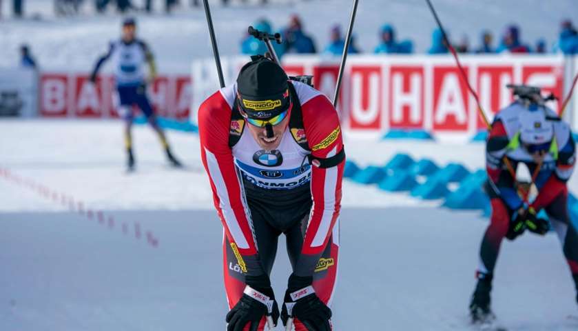 Austria\'s Julian Eberhard in the finish area after the men\'s 4X7.5 km relay