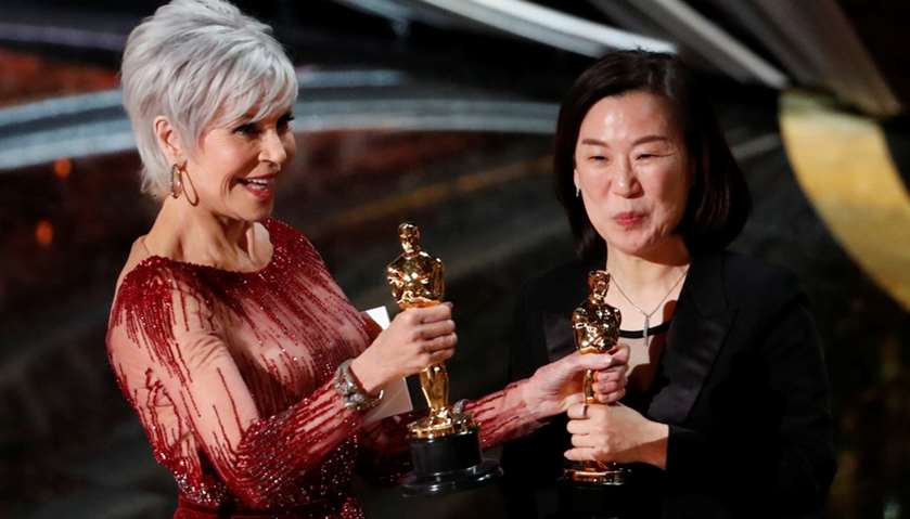 Kwak Sin Ae receives the Oscar for Best Picture for \"Parasite\" from Jane Fonda at the 92nd Academy A