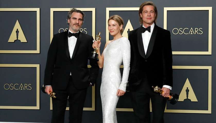 Best Actor winner Joaquin Phoenix, Best Actress Renee Zellweger and Best Supporting Actor Brad Pitt 