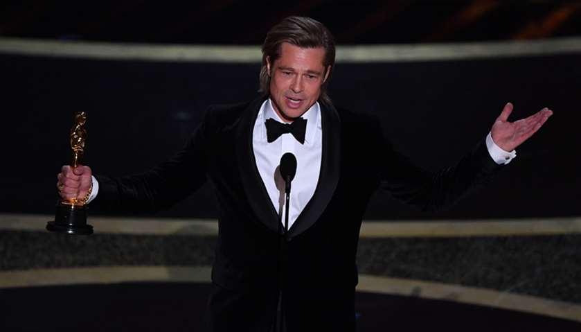 US actor Brad Pitt accepts the award for Best Actor in a Supporting Role for \"Once upon a Time...in 